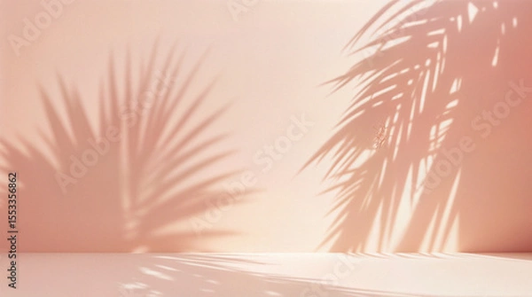 Obraz Blurred shadow from palm leaves on the light pink wall. Minimal abstract background for product presentation. Spring and summer.