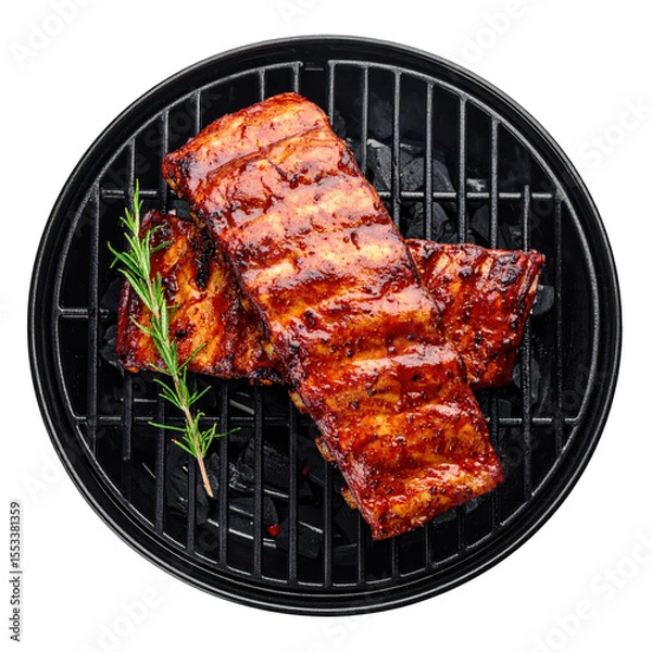 Fototapeta Close Up Of Delicious Barbecue Ribs On A Round Grill With A Sprig Of Rosemary Against A Transparent Backdrop Showcasing The Cooked Meat Its Texture And Color