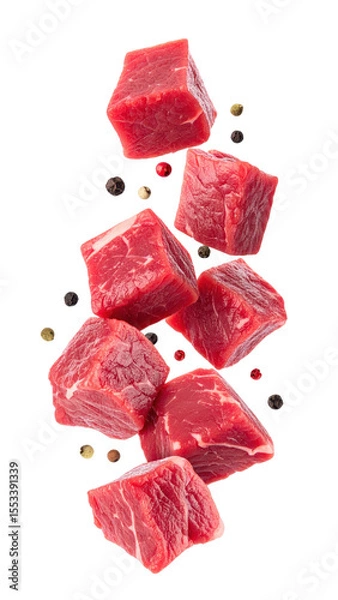 Fototapeta Red Beef Cubes Falling Against A Transparent Background Displaying Culinary Detail And Food Preparation with Pepper Seasoning