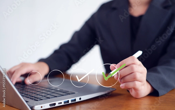 Fototapeta Businesswoman mark checkboxes, Survey form, check marks on checklist,Checklist concept.