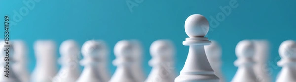 Obraz Close up portrait of white pawn chess piece standing out among blurred wooden chess pieces : Generative AI
