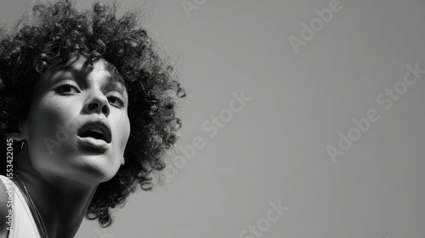 Fototapeta minimalist portrait of athlete expressing surprise positioned on left side of frame