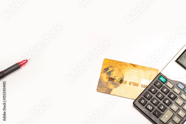 Obraz Credit card calculator and pen isolated on white background