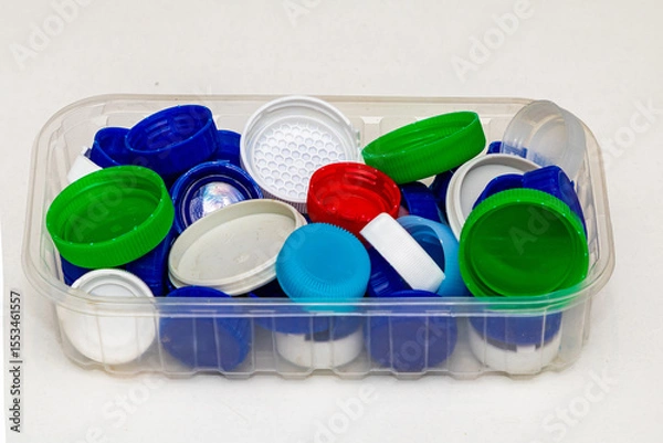 Obraz Pile of colorful plastic bottle caps ready for recycling