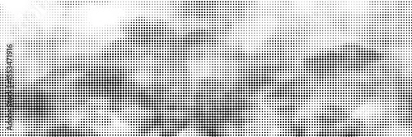 Fototapeta Background with monochrome dotted texture. Polka dot pattern template. vector ilustration