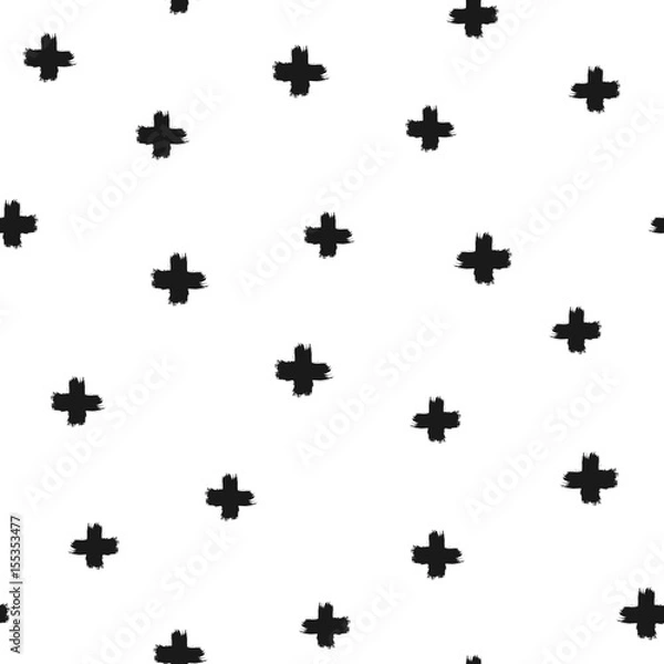 Fototapeta Randomly scattered crosses painted with a rough brush. Seamless pattern.