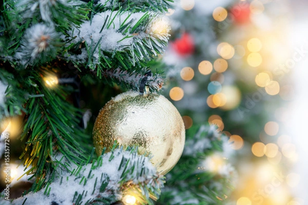 Obraz Festive pine tree decoration captured with a bokeh-filled background. Christmas background