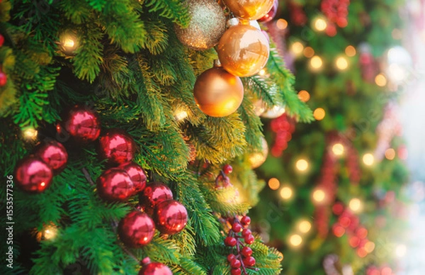 Obraz Festive pine tree decoration captured with a bokeh-filled background. Christmas background