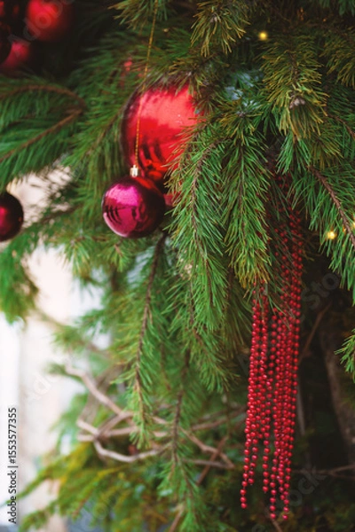 Obraz Festive pine tree decoration captured with a bokeh-filled background. Christmas background