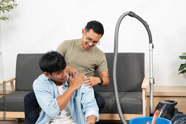 Obraz Affectionate LGBTQIA Couple Relaxing Together at Home