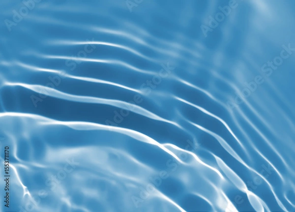 Obraz Abstract blurred shades of blue water background. Light and shadow ripples or splashes surface of water texture. Water waves with shining and reflection pattern photography for​ design artwork.