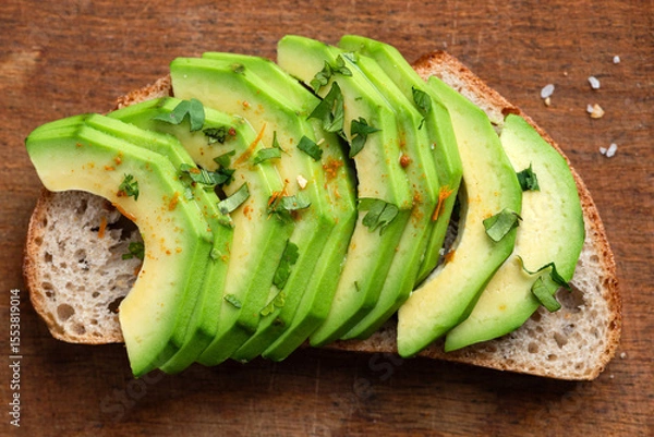 Fototapeta Detailed photo of delicious healthy vegan avocado toast, top view