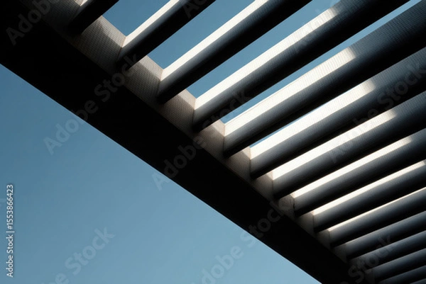 Fototapeta modern architectural facade emphasizing design elements that create play of shadows and light