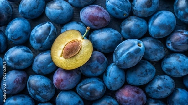 Obraz Blue plums background. Suitable for marketing or business purposes. Panoramic banner with place for text