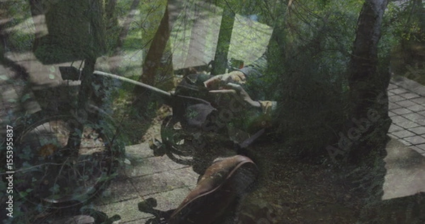 Fototapeta Wheelchair resting on wooden deck beside paved stone pathway in private garden, dappled sunlight
