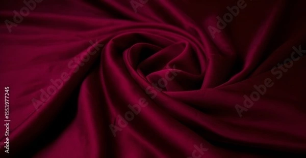 Fototapeta A close up of a red fabric with a spiral pattern