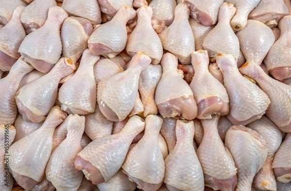 Obraz Fresh raw chicken drumsticks background. Suitable for marketing or business purposes