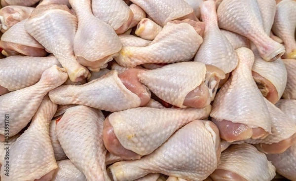 Obraz Fresh raw chicken drumsticks background. Suitable for marketing or business purposes