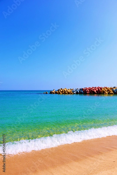 Obraz a colorful breakwater