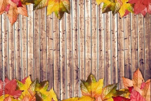 Fototapeta Rustic flat design panel is showcasing vertical wood planks with autumn maple leaves framing edges