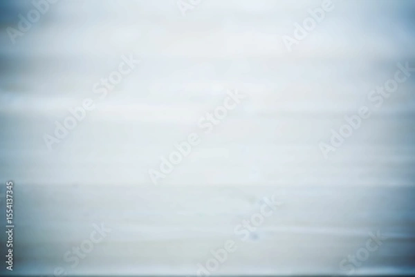 Fototapeta Blurry flat seascape showing calm water meeting pale sky, transparent background, copy space