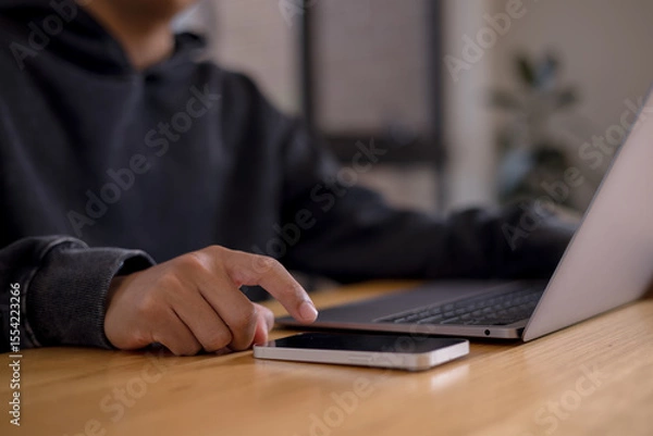 Fototapeta Social media and digital online concept, man using smart phone. The concept of living on vacation and playing social media. Social Distancing ,Working From Home