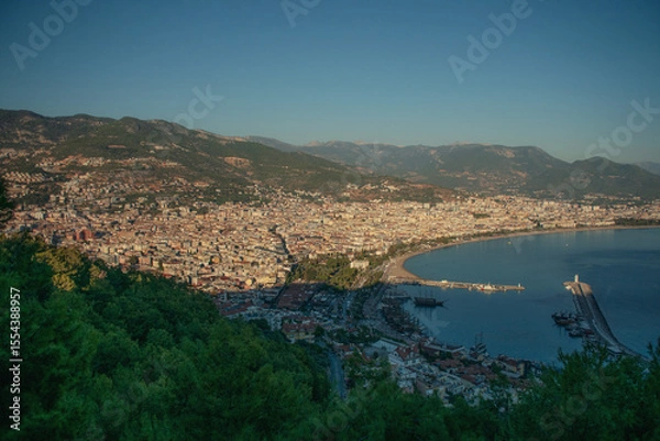 Fototapeta Turkish coastal town on a semicircular bay seen from above