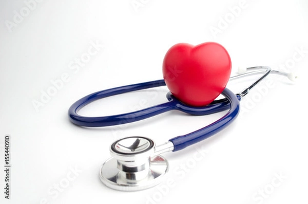 Fototapeta red heart and a stethoscope on white background, health care medical technology concept, soft focus, selective focus.