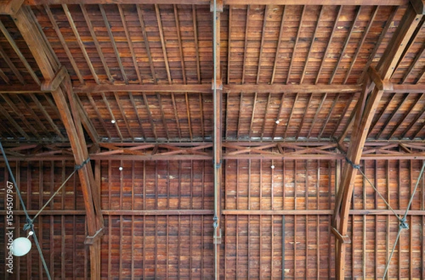 Fototapeta Indigenous Australian Jarrah hardwood roof beams, shingles. Beautiful, durable, strong. Natural resistance to fire, rot, and termites. Deforestation, forest fires, climate change threats. Background