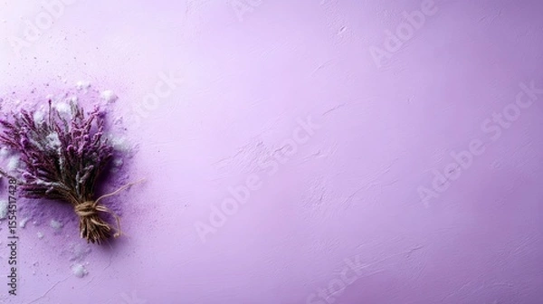 Obraz A delicate arrangement of dried lavender on a soft purple backdrop, representing natural beauty and tranquility, perfect for creating a calm and soothing ambiance.