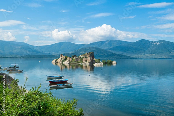 Fototapeta Kapıkırı, Muğla, Turkey; Herakleia Ancient City or Latmos Herakleia in Lake Bafa is one of the urban settlements of the Ancient Ionian region. Fishing boats in Lake Bafa.