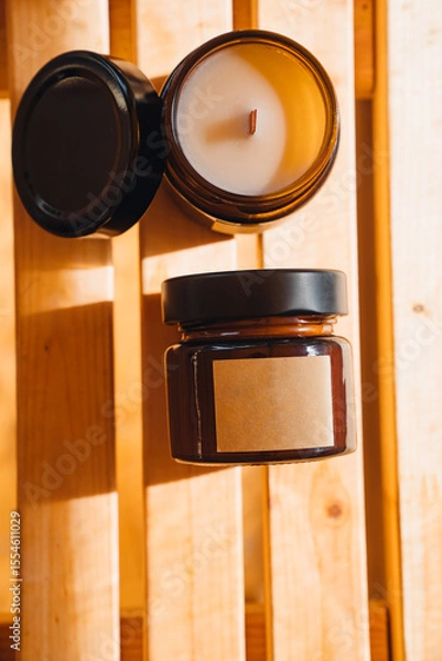 Obraz Scented candles on a wooden table.