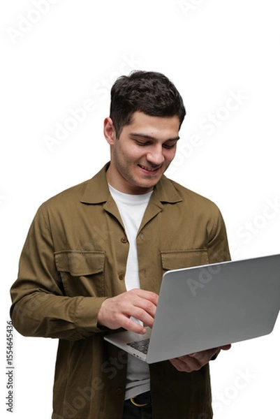 Fototapeta Man engaged in focused work on a laptop, showcasing creativity and concentration