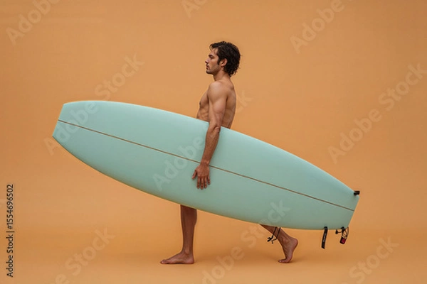 Fototapeta Surfer in studio