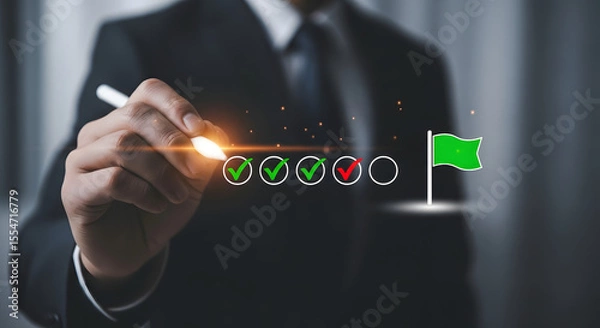 Fototapeta Businessman holding pen with holographic checklist and green flag, symbolizing completed tasks and successful project milestones in office.