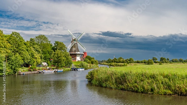 Obraz Gewitterfront über den Greetsieler Zwillingsmühlen in Ostfriesland, Ostfriesland, Deutschland