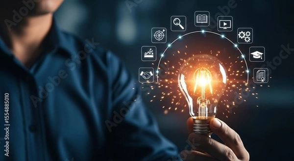 Obraz Person Holding Glowing Lightbulb with Surrounding Digital Icons Ideas Innovation Technology Concept bright