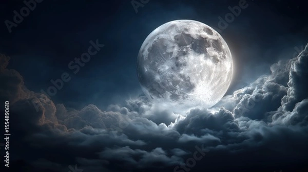 Obraz Celestial Serenity: A captivating scene unfolds as a full moon majestically graces a dark, cloud-filled night sky, its luminous glow casting an ethereal spell upon the atmospheric canvas.