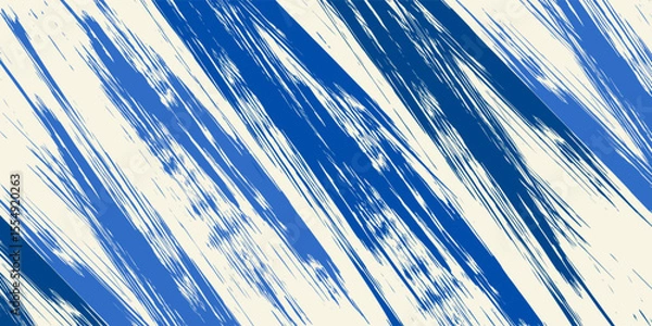 Fototapeta Grainy blue bold brush stroke with spray texture. Hand drawn distress damaged edge vintage template, banner. Grainy bold brush strokes texture with small dots