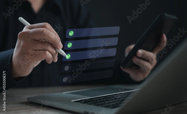 Fototapeta User completing checklist tasks using stylus and mobile device over a digital interface, representing task management, synchronization, productivity, and workflow tracking in modern work systems.