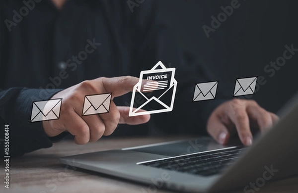 Fototapeta User tapping on a virtual invoice icon displayed above a laptop, representing online billing, digital payment systems, financial document management, and modern e-invoice access process.