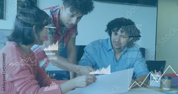 Obraz Collaborating on project, team using data visualization image in office setting