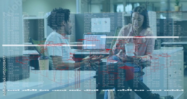 Fototapeta Two colleagues in business attire studying holographic data display in modern office room, with pen