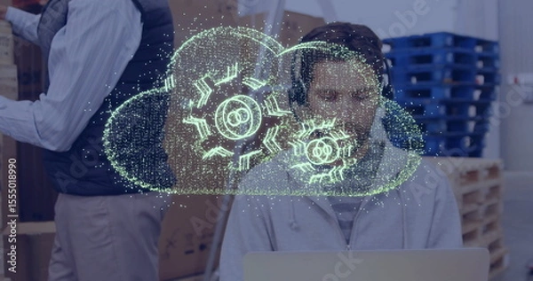 Obraz Cloud computing image over person working on laptop in office setting