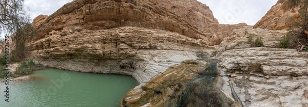 Fototapeta Shallow  narrow mountain stream and small lake in Arugot Stream Nature Reserve near Dead Sea in the southern Israel