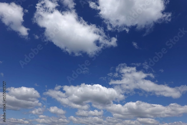 Fototapeta Nice beautiful cirrus clouds on blue sky in daytime as natural background