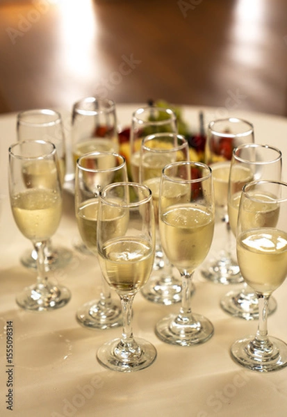 Obraz Array of Sparkling Drinks Elegantly Set on a Table for Celebrations or Events