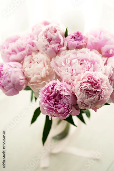 Obraz Beautiful Pink Peony Bouquet with Soft Petals and Green Leaves in a Vase
