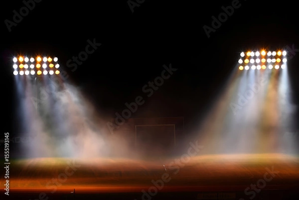 Fototapeta Dramatic Stadium Night Scene:  Twin Floodlights Illuminate Smoky Field,  Creating Atmospheric Stage.