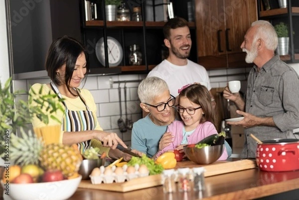 Obraz Multi-generational family together in the kitchen